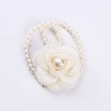 The new pearl hair band exudes a light luxury and trendy Korean style. It features a small flower-shaped female ponytail band headwear and a leather band hair tie Item Picture